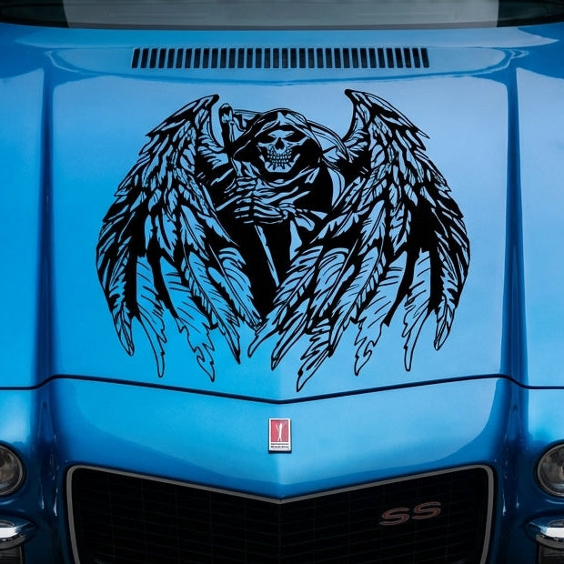"Black vinyl decal of hooded Grim Reaper skull with large feathered angel wings, centered on blue muscle car hood."

