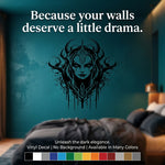 Wall decal of an evil witch on a teal wall, text 'Because your walls deserve a little drama'.
