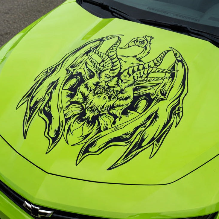 Muscle car with a large black chimera creature decal featuring lion, goat, and serpent elements displayed across the hood

