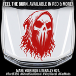 Red ghost skull with flowing flame design vinyl decal displayed on an white truck hood