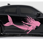 A black sedan shown in side profile on a light gray studio background, featuring a large pink mermaid decal running along the side panel.