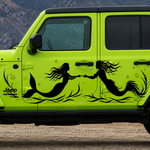 A bright lime green Jeep Wrangler parked outdoors on a dirt road with mountains in the background. The side of the vehicle features a large black mermaid and merman graphic decal.