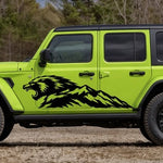 Black Mountain Beast vinyl decal on the side of a lime green Jeep Wrangler