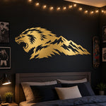 Gold Mountain Beast wall decal on a dark bedroom wall with string lights