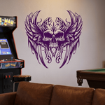 Purple gothic winged skull viny decal in purple on game room wall