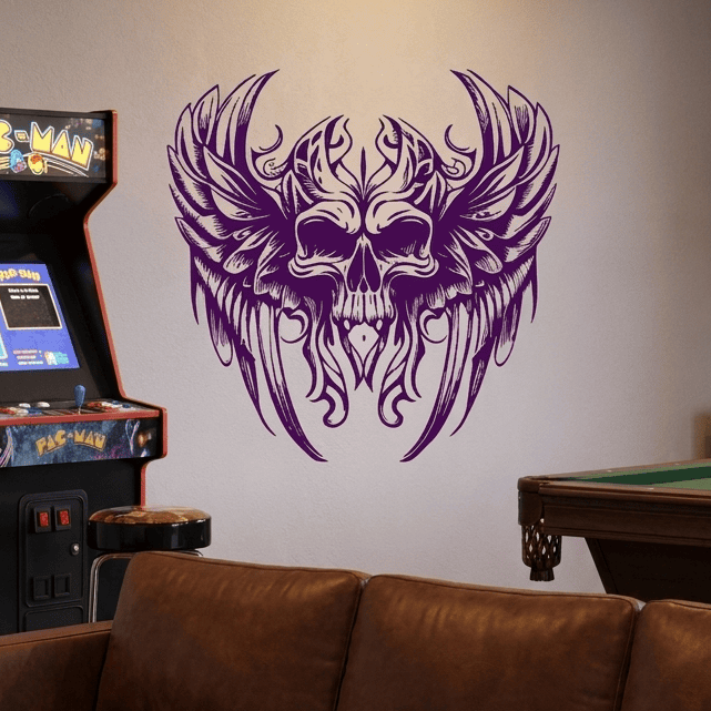 Purple gothic winged skull viny decal in purple on game room wall