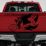 Black Sonic the Hedgehog vinyl decal applied to a red truck tailgate