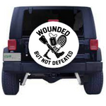 “Black matte ‘Wounded But Not Defeated’ amputee decal on tire cover 29×29