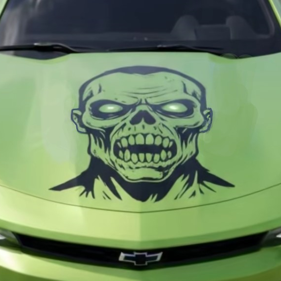 Green car with a skull decal on the hood
