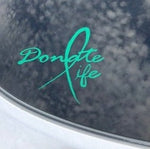 “Green ‘Donate Life’ awareness car decal on tinted rear glass, 12‑inch width”