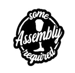 Black ‘Some Assembly Required’ handicapped humor car decal on light tailgate, high‑contrast lettering