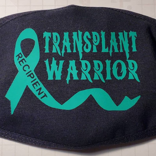 “Transplant Warrior" cotton face mask with green HTV graphic, approx. 4×3 in, reusable, non‑medical