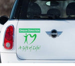 “Organ Donation — A Gift of Life vinyl car window decal, white, 9‑inch width, die‑cut with no background on tinted rear glass”