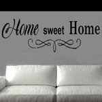 “Home Sweet Home vinyl wall decal in matte black, 20×10, applied to smooth painted wall”