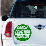 “Organ Donation Saves Lives" vinyl car window decal, white, 11‑inch width, die‑cut with no background on tinted glass