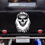 “Redneck Skull vinyl car window decal, white, 9‑inch width, die‑cut with no background on tinted rear glass”
